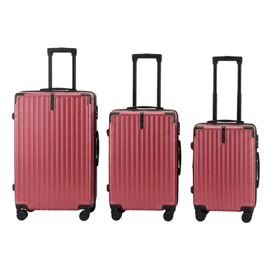 Three red suitcases of different sizes on a white background