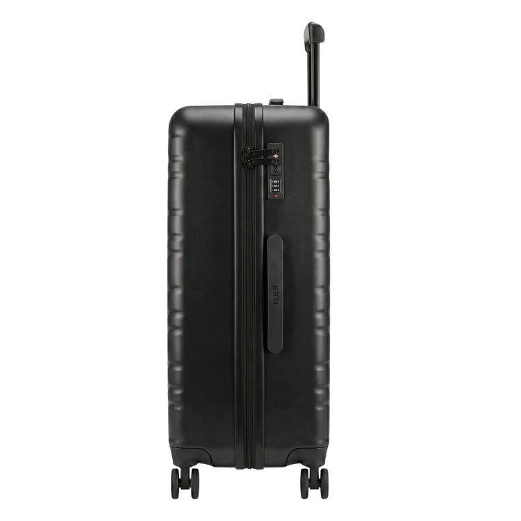 FLIEGER 8844 3pc hard shell suitcase set in black, navy, champagne, and grey featuring 360 degree mobility and lightweight spinner design.