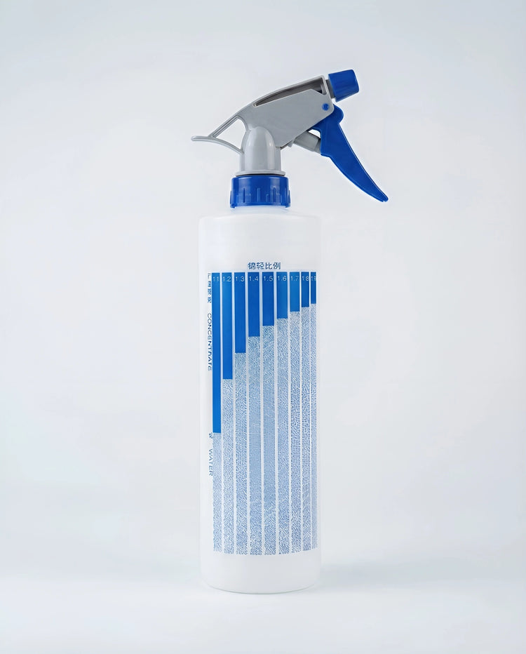 Durable 500mL plastic trigger spray bottle with visible volume measurement markings, an adjustable nozzle head, and an ergonomic handle.