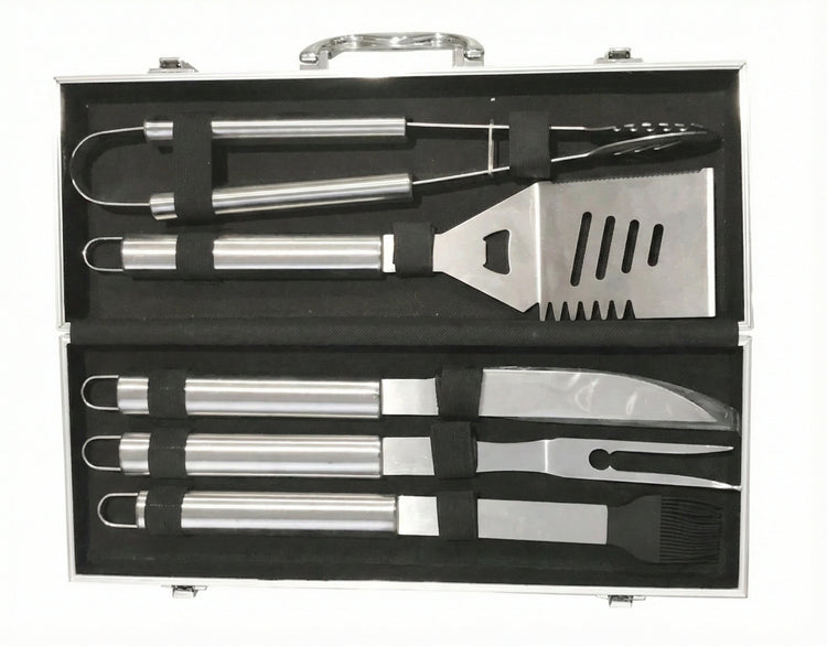 Open silver aluminum hard case displaying a 5-piece stainless steel BBQ tool set including spatula with bottle opener tongs knife fork and brush.