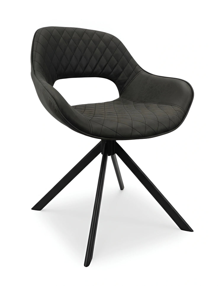 Angled view of a modern black dining chair with diamond stitching and black legs UT-C4202