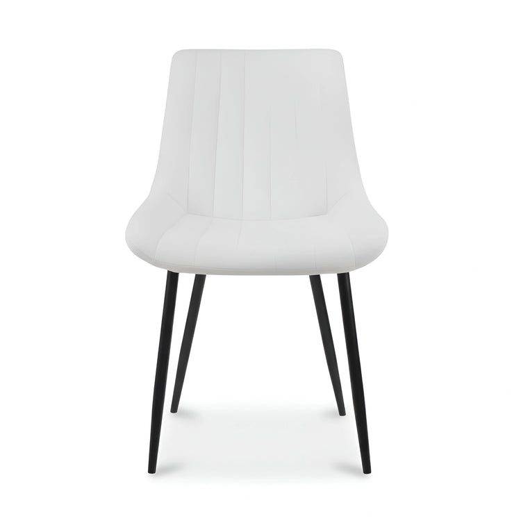 Frontal view of a modern cream velvet dining chair with vertical tufting UT-C7050
