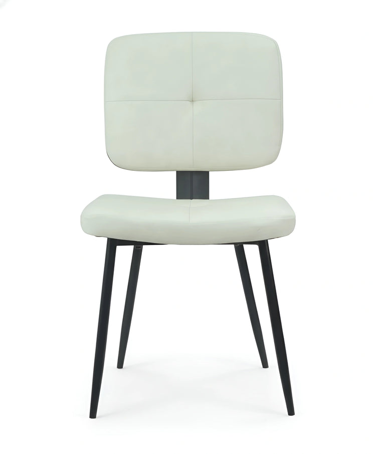 Frontal view of a modern cream upholstered dining chair with black legs UT-C8542