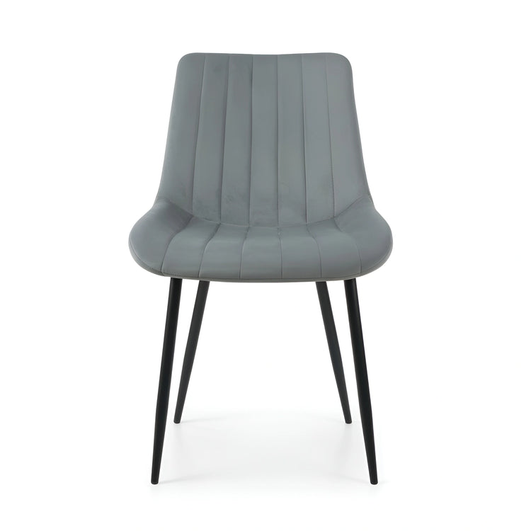 Frontal view of a modern gray velvet dining chair with a padded seat UT-C7050
