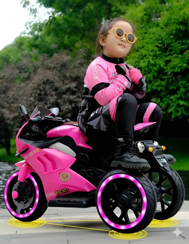 Young girl in a pink racing outfit on a pink electric ride-on motorcycle trike Y-MB7105