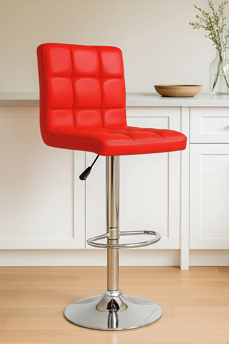 Red bar stool with chrome base in a kitchen setting