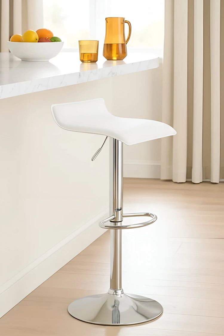 White bar stool with chrome base in a kitchen setting