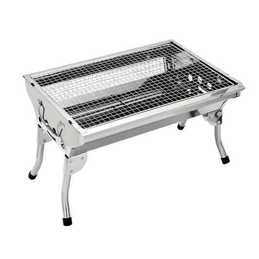 Angled view of a small stainless steel charcoal BBQ grill in a folded position 2051