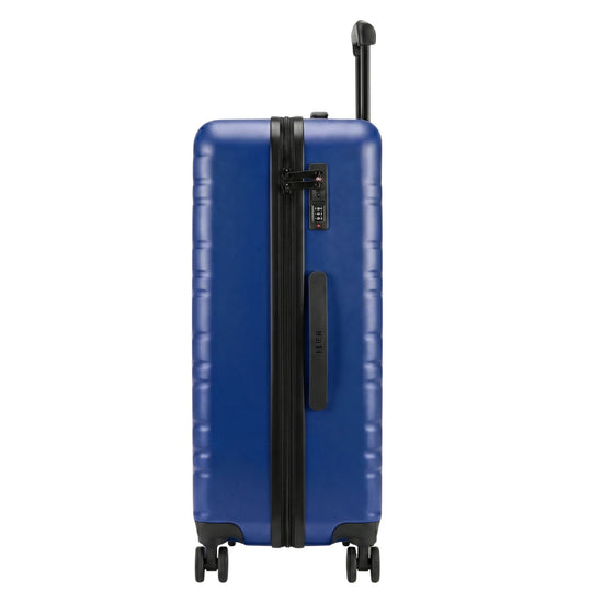 FLIEGER 8844 3pc hard shell suitcase set in black, navy, champagne, and grey featuring 360 degree mobility and lightweight spinner design.
