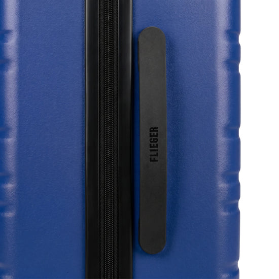 FLIEGER 8844 3pc hard shell suitcase set in black, navy, champagne, and grey featuring 360 degree mobility and lightweight spinner design.