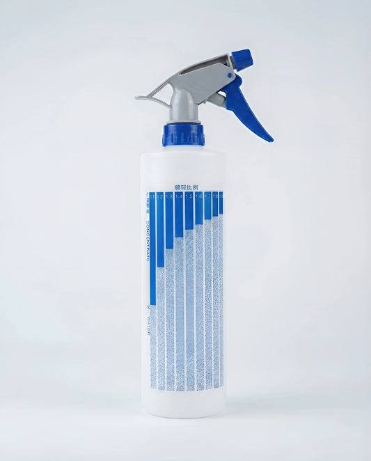 Durable 500mL plastic trigger spray bottle with visible volume measurement markings, an adjustable nozzle head, and an ergonomic handle.