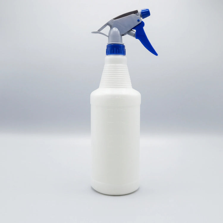 Large 800mL heavy-duty plastic trigger spray bottle with molded dilution ratio scales, ribbed neck grip, and adjustable nozzle for professional cleaning.
