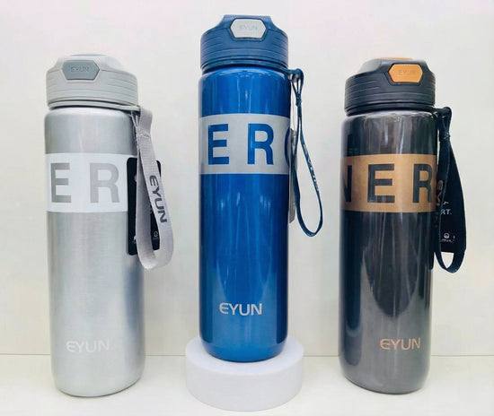 Eyun plastic sport water bottles in silver, blue, and black standing in a row, featuring a shiny finish, push-button flip-top lids, and fabric carry straps.
