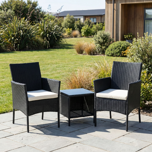 Black rattan outdoor bistro set with two cream cushioned chairs and side table JHA-323