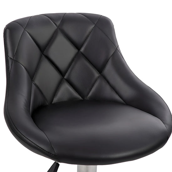 Black quilted chair on a white background