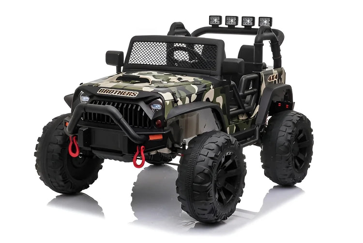 Camouflage toy jeep truck with large wheels on a white background