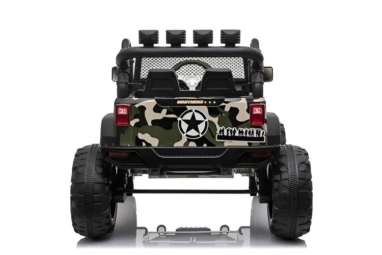 Toy jeep truck with camouflage design and star emblem on a white background