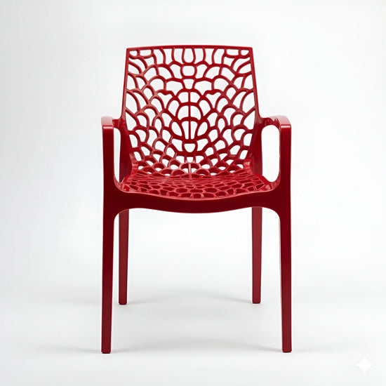 Frontal view of a red stackable plastic chair with a spiderweb design YH-675