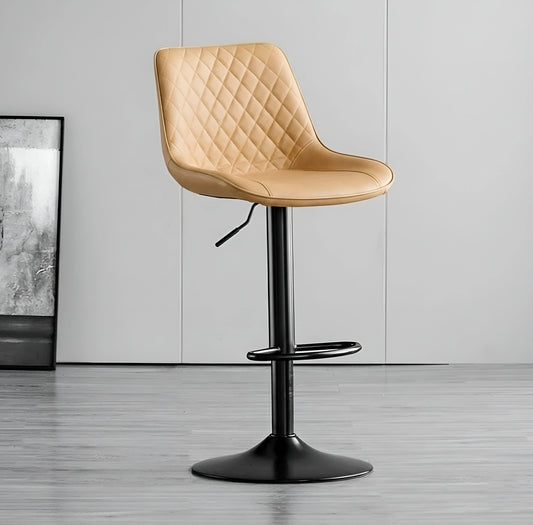 Beige quilted bar stool with black base on a gray floor.