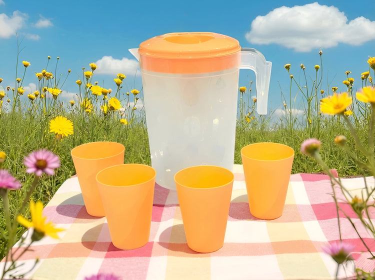 2 litre plastic water pitcher with coloured lid and 4 matching cups on a picnic blanket, product code 8639 DD1163.
