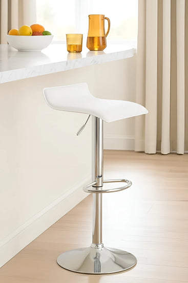 White bar stool with chrome base in a kitchen setting